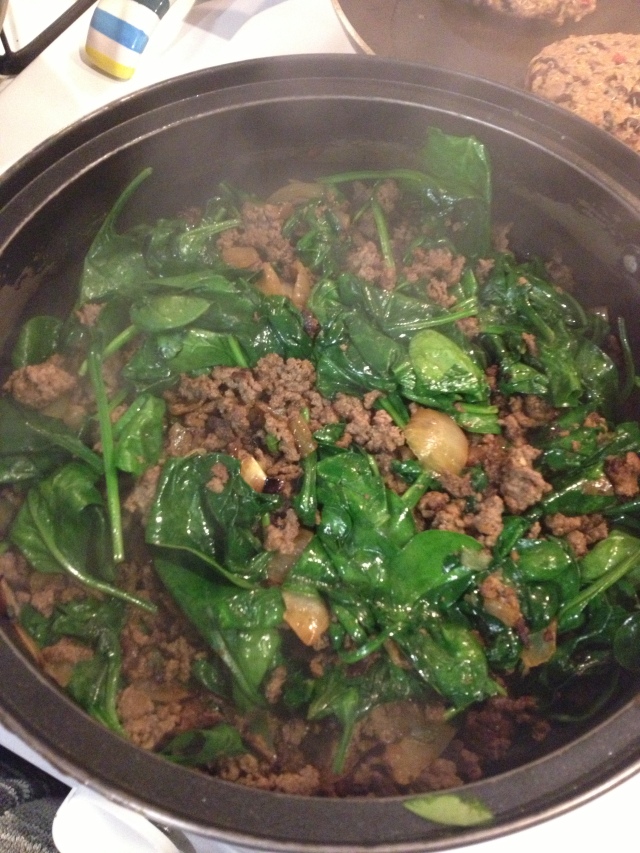 Stir the spinach until it becomes slightly wilted, and then add the eggs.
